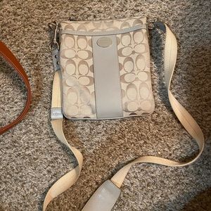Coach crossbody and matching wallet needs cleaning